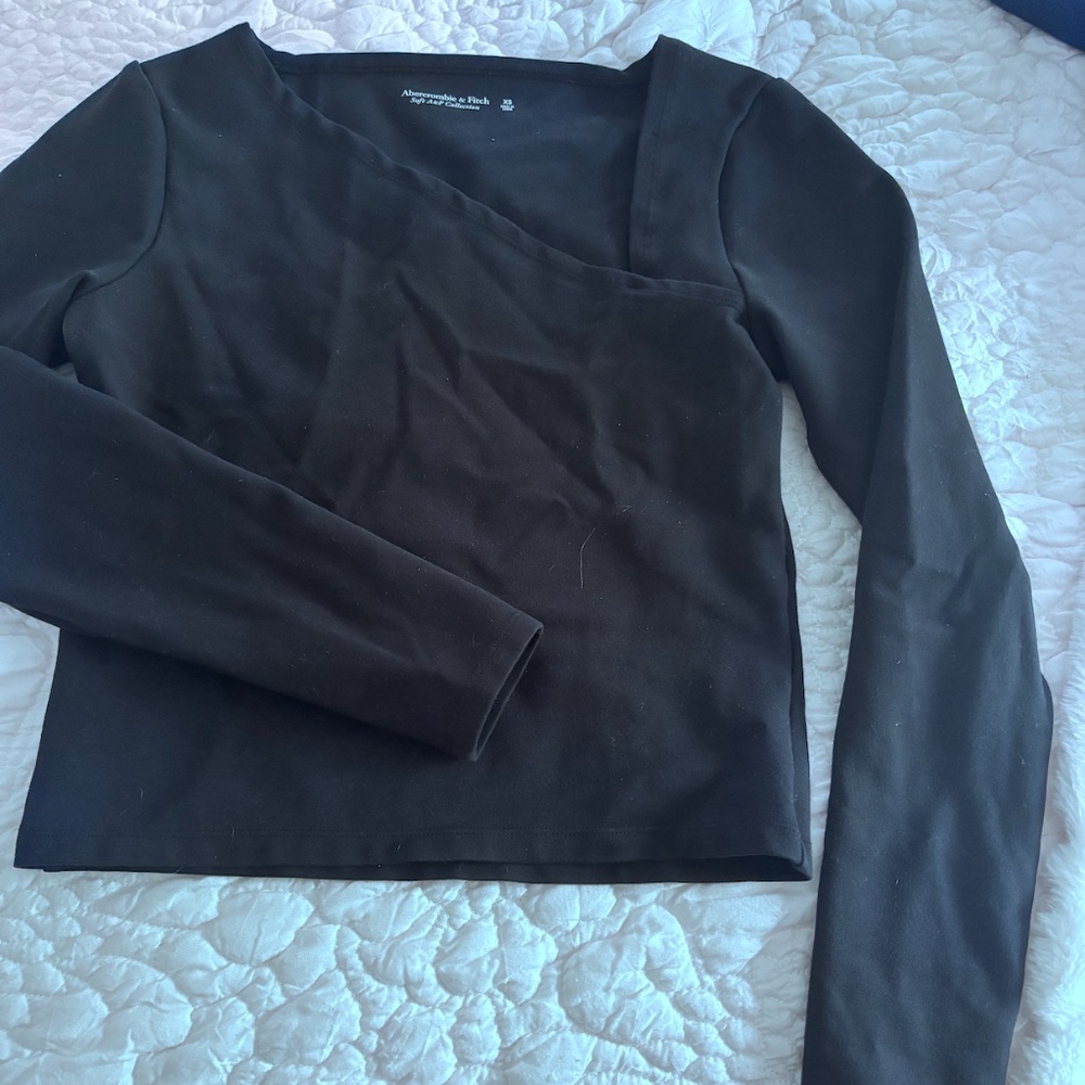 black angled scoop neck top